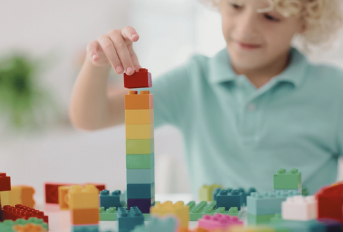 Child playing with building blocks.